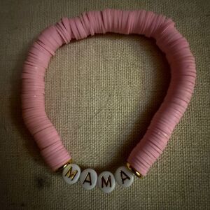 Pink round stretch puca shell friendship bracelet with white MAMA beads.  NWOT